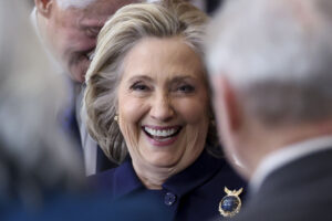 Hillary Clinton, at the Trump inauguration last week, still blames her 2016 loss on Vladimir Putin. / Pool Reuters