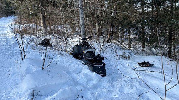 Woman seriously injured in snowmobile crash