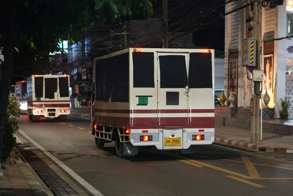 This photo provided by Thailand's daily web newspaper Prachatai shows trucks with black tape covering the windows leave a detention center in Bangkok, Thailand, on Feb. 27, 2025. |  Nuttaphol Meksobhon/Prachatai via AP